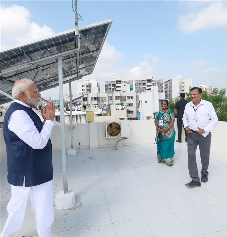 PM interacting with beneficiaries of PM Surya Ghar Muft Bijli Yojana at Gandhinagar, in Gujarat on September 16, 2024.