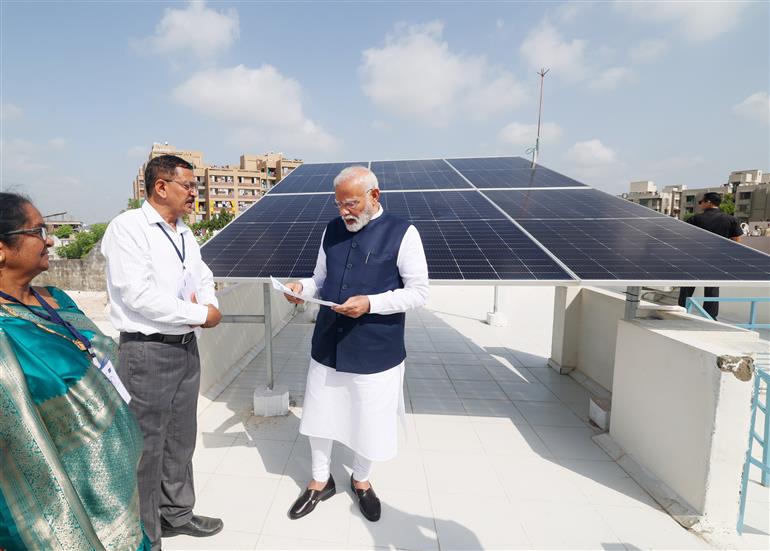 PM interacting with beneficiaries of PM Surya Ghar Muft Bijli Yojana at Gandhinagar, in Gujarat on September 16, 2024.