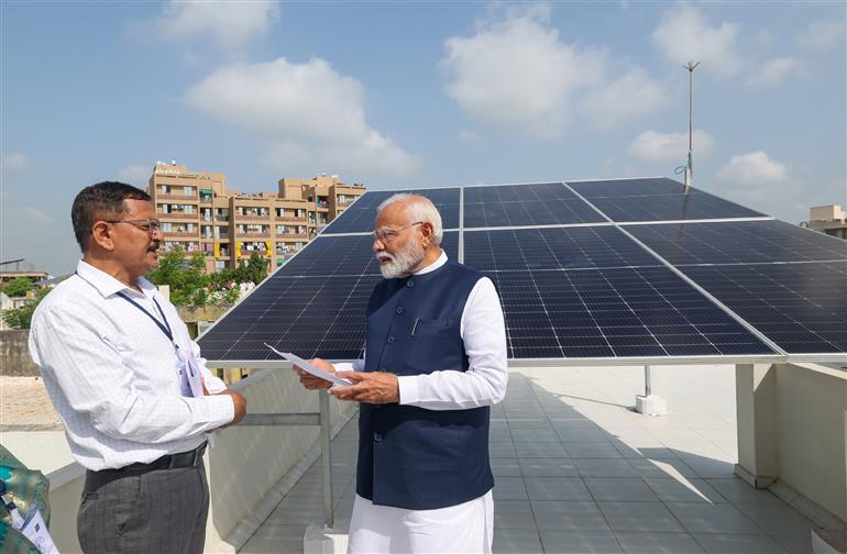 PM interacting with beneficiaries of PM Surya Ghar Muft Bijli Yojana at Gandhinagar, in Gujarat on September 16, 2024.