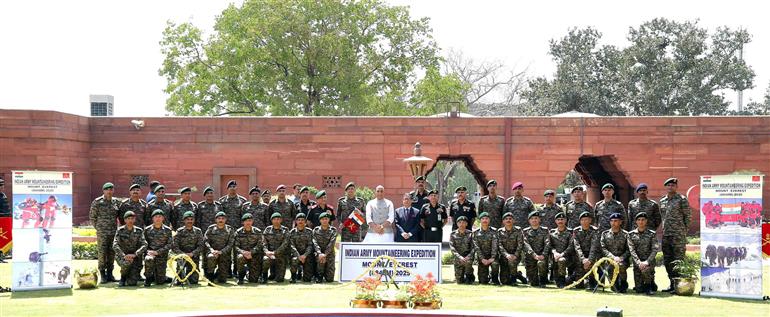 The Union Minister for Defence, Shri Rajnath Singh in a group photograph at the flagging off ceremony of expeditions to Mount Everest (8,848m) and Mount Kangchenjunga (8,586m) at South Block, in New Delhi on April 03, 2025.
