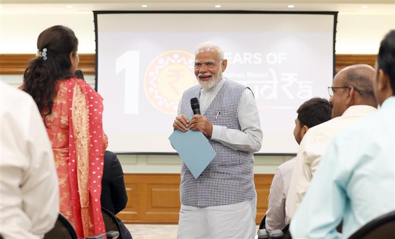 PM interacting with the beneficiaries of Pradhan Mantri Mudra Yojana at his residence, in New Delhi on April 08, 2025.