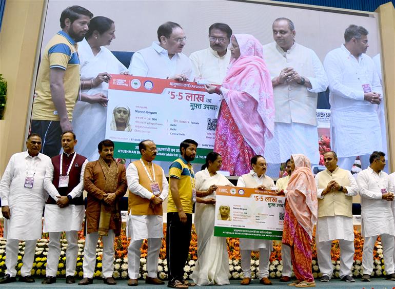 The Union Minister of Health and Family Welfare & Chemicals and Fertilizers, Shri Jagat Prakash Nadda and the Chief Minister of Delhi, Smt. Rekha Gupta distribute Ayushman Cards to beneficiaries, in New Delhi on April 10, 2025.