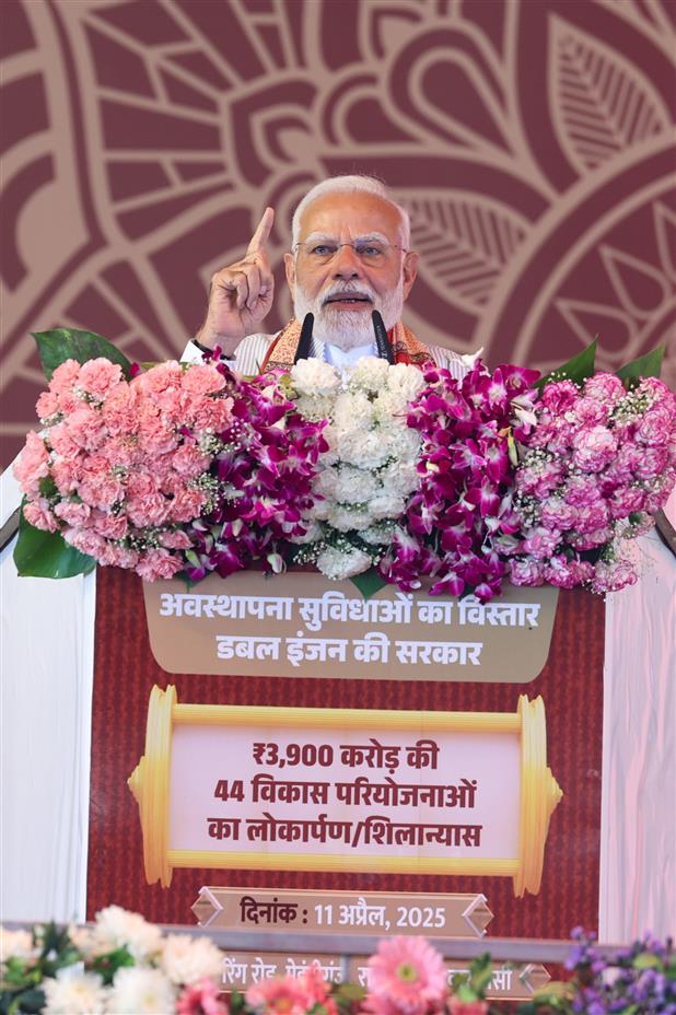 PM addressing at foundation stone laying and inauguration of various projects at Varanasi, in Uttar Pradesh on April 11, 2025.