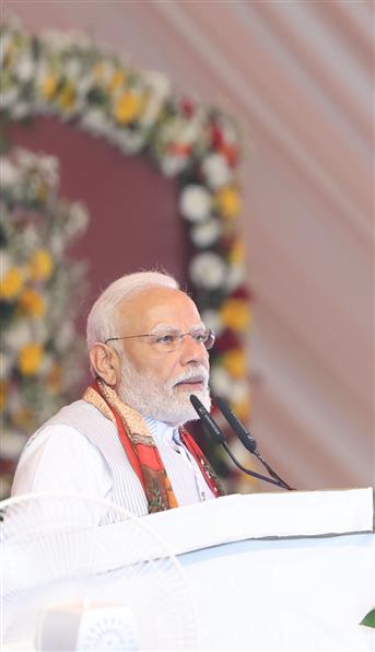 PM addressing at foundation stone laying and inauguration of various projects at Varanasi, in Uttar Pradesh on April 11, 2025.