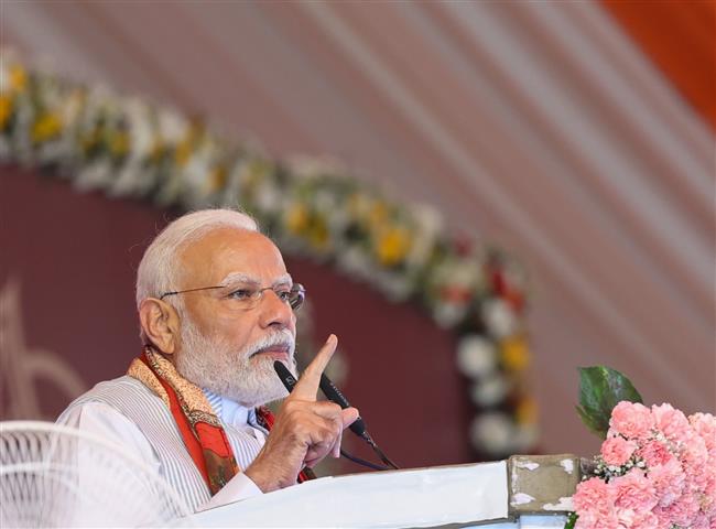 PM addressing at foundation stone laying and inauguration of various projects at Varanasi, in Uttar Pradesh on April 11, 2025.