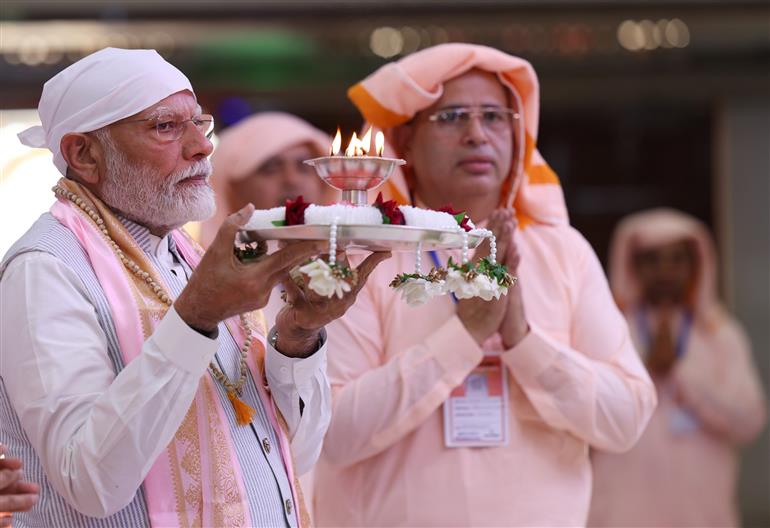 PM performs Darshan and Pooja at Guru Ji Maharaj Temple, in Madhya Pradesh on April 11, 2025.