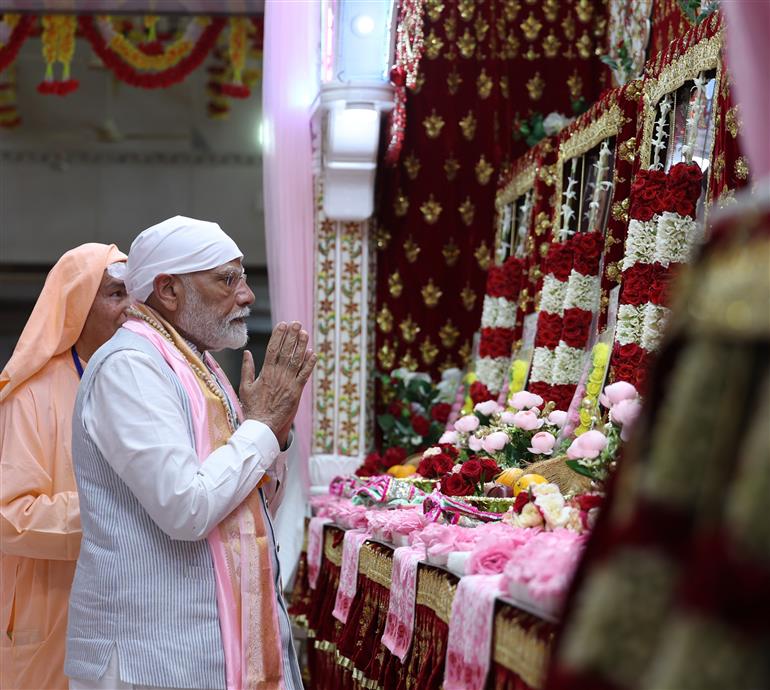 PM performs Darshan and Pooja at Guru Ji Maharaj Temple, in Madhya Pradesh on April 11, 2025.