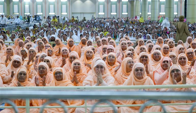 PM addressing the gathering during the visit of the Anandpur Dham, in Madhya Pradesh on April 11, 2025.