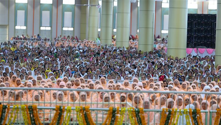 PM addressing the gathering during the visit of the Anandpur Dham, in Madhya Pradesh on April 11, 2025.