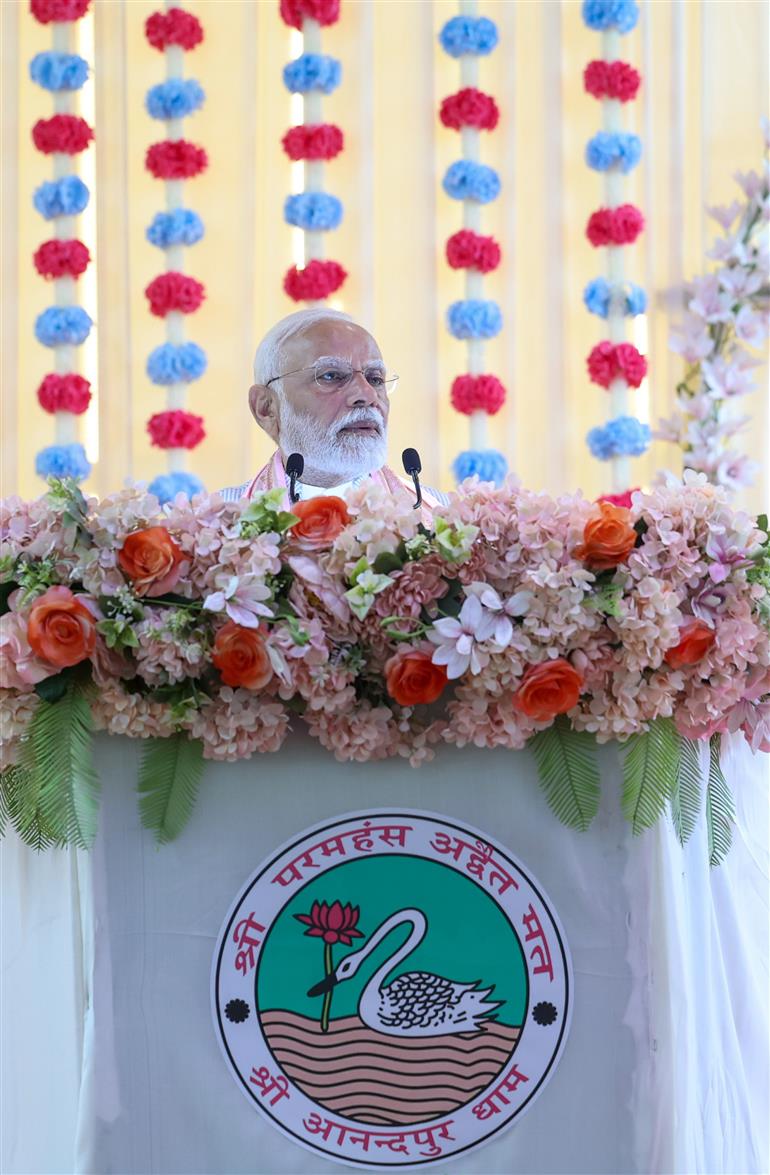 PM addressing the gathering during the visit of the Anandpur Dham, in Madhya Pradesh on April 11, 2025.