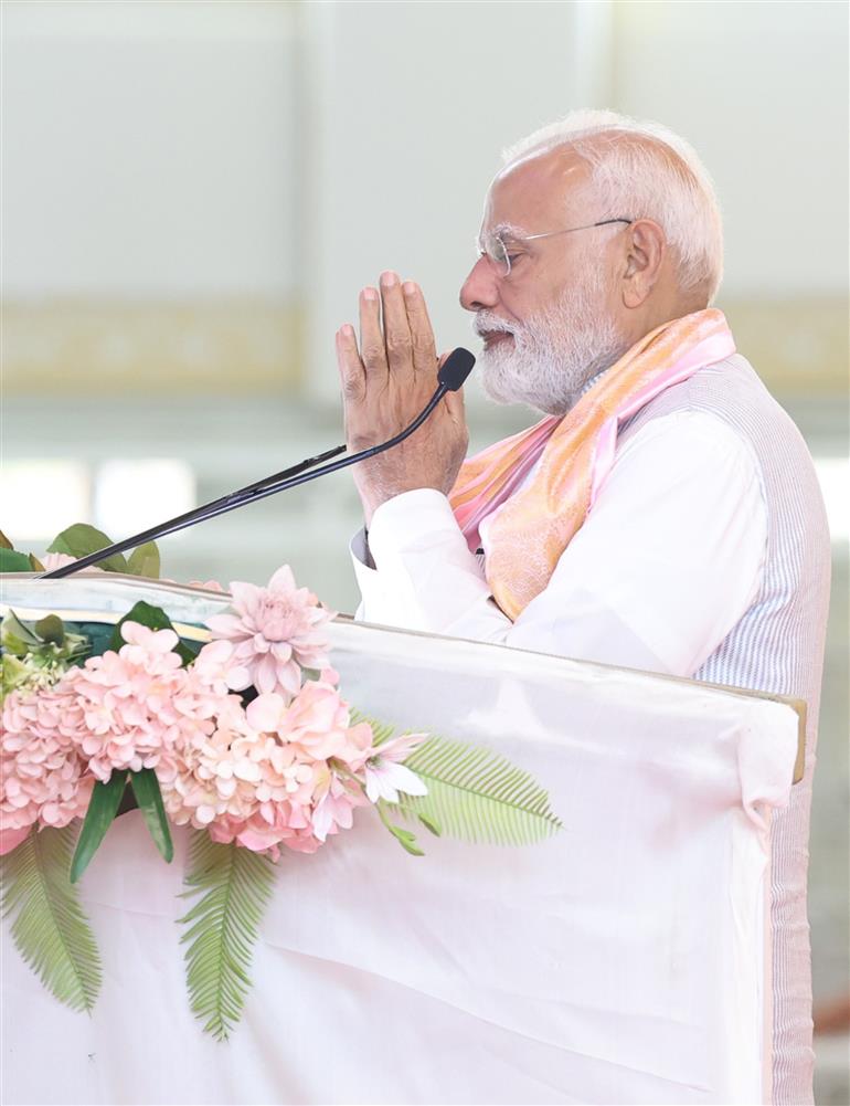 PM addressing the gathering during the visit of the Anandpur Dham, in Madhya Pradesh on April 11, 2025.