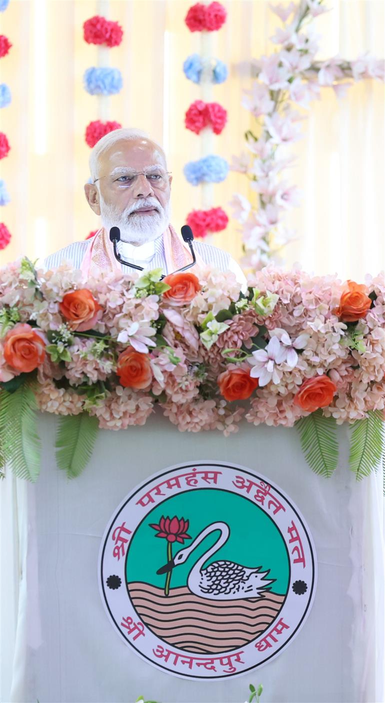 PM addressing the gathering during the visit of the Anandpur Dham, in Madhya Pradesh on April 11, 2025.