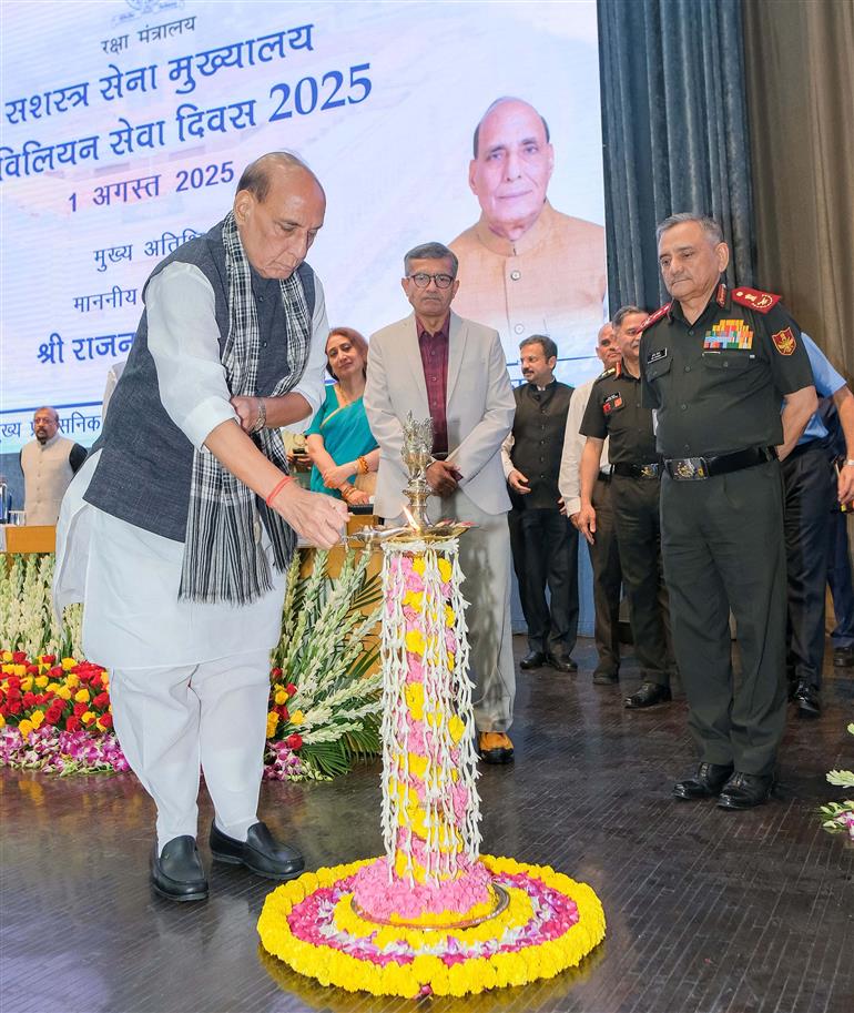 The Union Minister for Defence, Shri Rajnath Singh lighting the lamp during the 84th Armed Forces Headquarters (AFHQ) Civilian Services Day event held at DRDO Bhawan, in New Delhi on August 01, 2025.