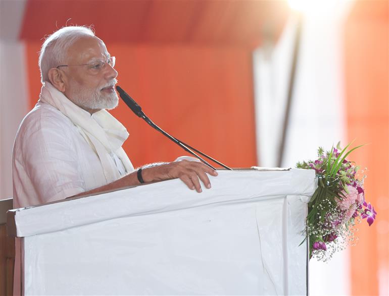 PM addressing the gathering at public event held on the sidelines of the foundation stone laying and inauguration of the multiple development projects at Varanasi, in Uttar Pradesh on August 02, 2025.