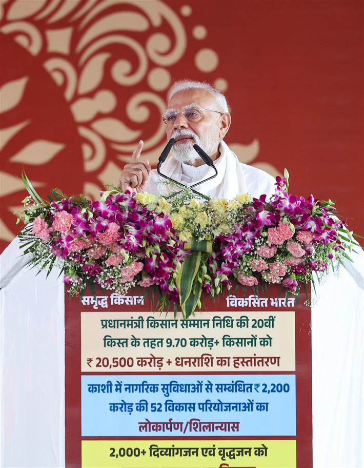PM addressing the gathering at public event held on the sidelines of the foundation stone laying and inauguration of the multiple development projects at Varanasi, in Uttar Pradesh on August 02, 2025.
