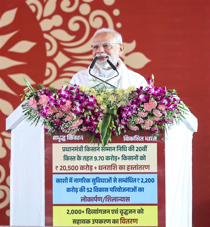 PM addressing the gathering at public event held on the sidelines of the foundation stone laying and inauguration of the multiple development projects at Varanasi, in Uttar Pradesh on August 02, 2025.