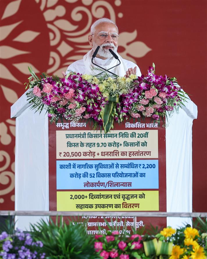 PM addressing the gathering at public event held on the sidelines of the foundation stone laying and inauguration of the multiple development projects at Varanasi, in Uttar Pradesh on August 02, 2025.