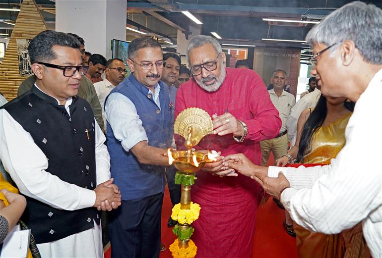 The Union Minister of Textiles, Shri Giriraj Singh lighting the lamp at the occasion of 11th National Handloom Day 2025, in New Delhi on August 05, 2025. The Minister of State for External Affairs and Textiles, Shri Pabitra Margherita is also seen.