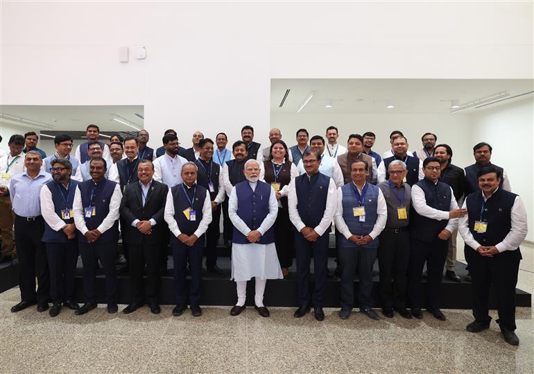 PM in a group photograph during the inauguration of Kartavya Bhavan, in New Delhi on August 06, 2025.
