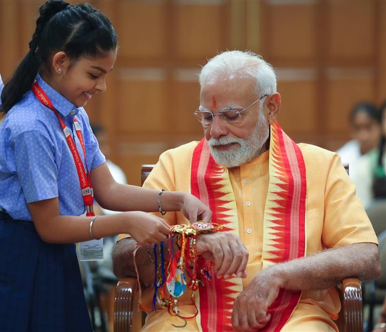 PM celebrates the festival of Raksha Bandhan with children from different schools at his residence (7, Lok Kalyan Marg), in New Delhi on August 09, 2025.