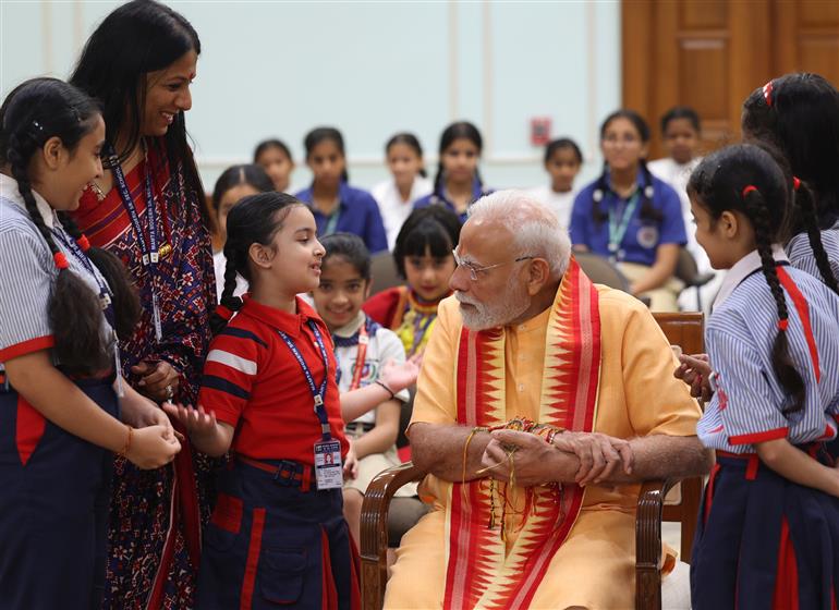 PM celebrates the festival of Raksha Bandhan with children from different schools at his residence (7, Lok Kalyan Marg), in New Delhi on August 09, 2025.