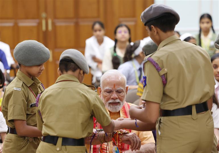PM celebrates the festival of Raksha Bandhan with children from different schools at his residence (7, Lok Kalyan Marg), in New Delhi on August 09, 2025.