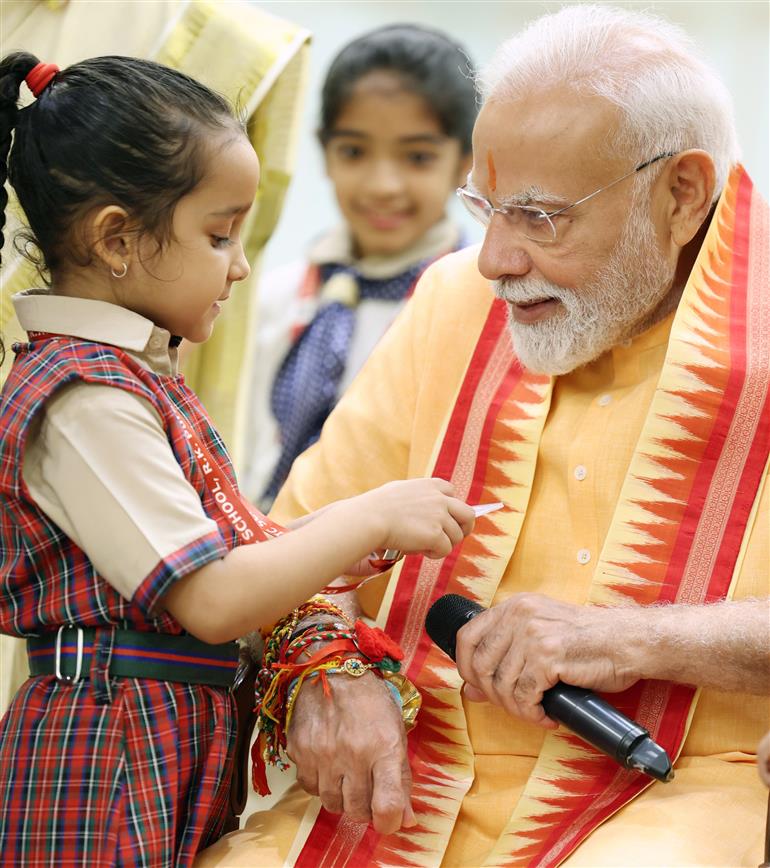 PM celebrates the festival of Raksha Bandhan with children from different schools at his residence (7, Lok Kalyan Marg), in New Delhi on August 09, 2025.