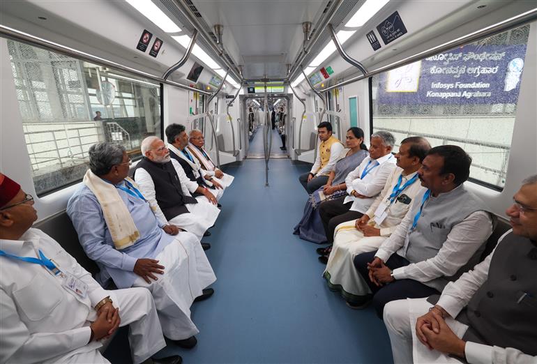 PM undertakes a Metro ride from RV Road (Ragigudda) to Electronic City metro station on the sidelines of the flagging-off ceremony of Yellow line of Bangalore metro at Bengaluru, in Karnataka on August 10, 2025.
