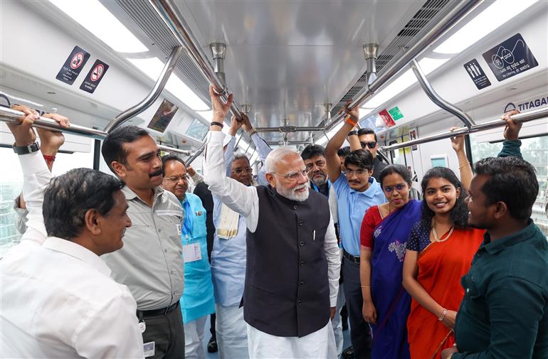 PM undertakes a Metro ride from RV Road (Ragigudda) to Electronic City metro station on the sidelines of the flagging-off ceremony of Yellow line of Bangalore metro at Bengaluru, in Karnataka on August 10, 2025.
