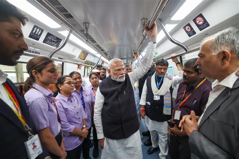 PM undertakes a Metro ride from RV Road (Ragigudda) to Electronic City metro station on the sidelines of the flagging-off ceremony of Yellow line of Bangalore metro at Bengaluru, in Karnataka on August 10, 2025.