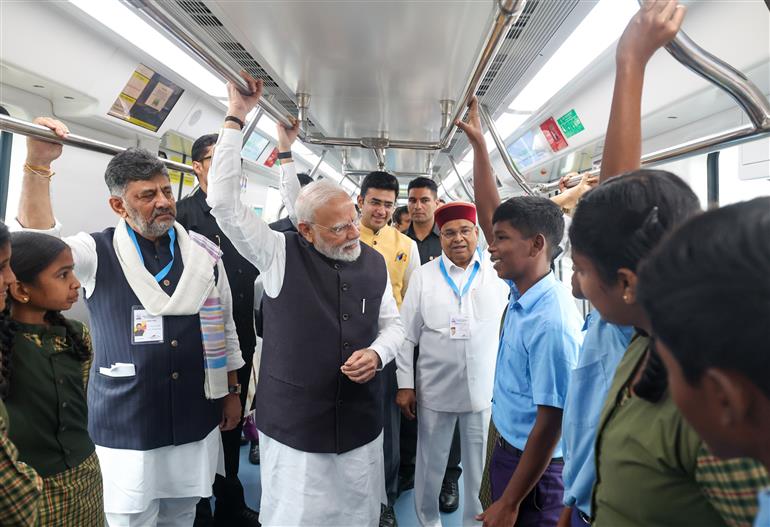 PM undertakes a Metro ride from RV Road (Ragigudda) to Electronic City metro station on the sidelines of the flagging-off ceremony of Yellow line of Bangalore metro at Bengaluru, in Karnataka on August 10, 2025.
