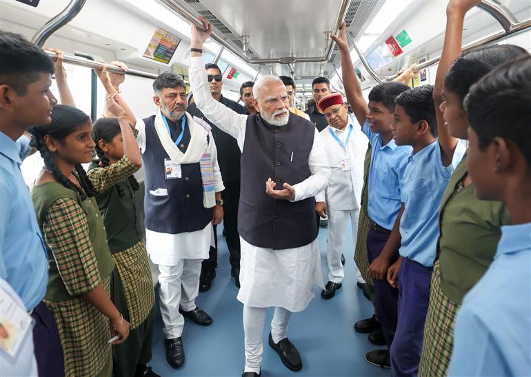 PM undertakes a Metro ride from RV Road (Ragigudda) to Electronic City metro station on the sidelines of the flagging-off ceremony of Yellow line of Bangalore metro at Bengaluru, in Karnataka on August 10, 2025.