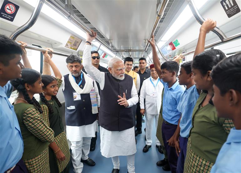 PM undertakes a Metro ride from RV Road (Ragigudda) to Electronic City metro station on the sidelines of the flagging-off ceremony of Yellow line of Bangalore metro at Bengaluru, in Karnataka on August 10, 2025.