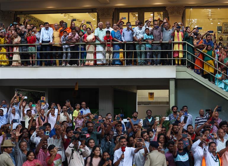 PM receives warm welcome by enthusiastic crowd during the Road Show on his arrival at Bengaluru, in Karnataka on August 10, 2025.