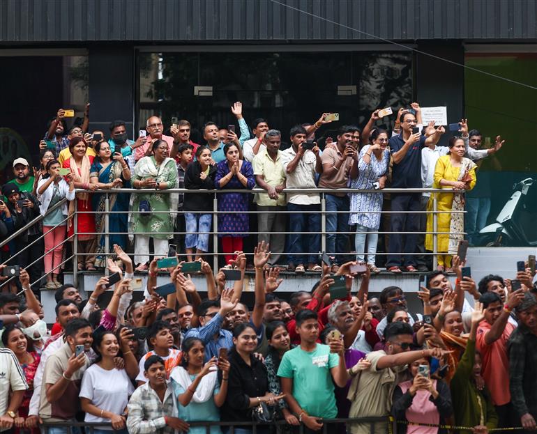 PM receives warm welcome by enthusiastic crowd during the Road Show on his arrival at Bengaluru, in Karnataka on August 10, 2025.