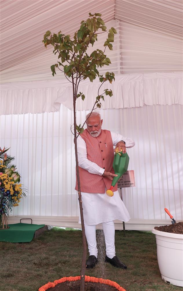 PM planting a sapling during the inauguration of newly constructed flats for Members of Parliament, in New Delhi on August 11, 2025.
