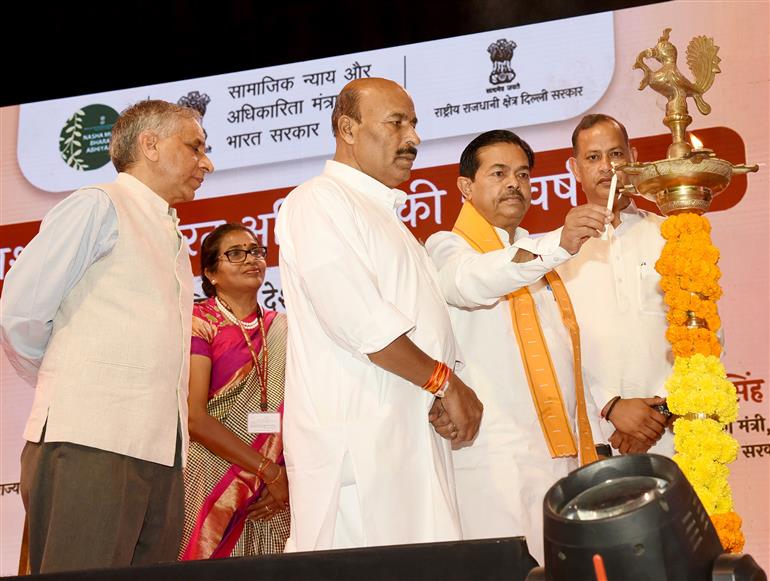 The Minister of State for Consumer Affairs, Food and Public Distribution and Social Justice and Empowerment, Shri B. L. Verma lighting the lamp at the celebration of 5 Years of Nasha Mukt Bharat Abhiyaan in presence of the Union Minister for Social Justice and Empowerment, Dr. Virendra Kumar at Kendriya Vidyalaya, in New Delhi on August 13, 2025.