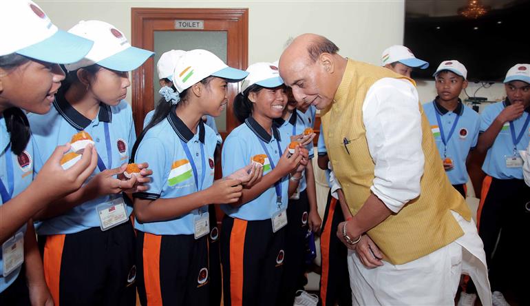 The Union Minister for Defence, Shri Rajnath Singh interaction with 30 meritorious higher secondary students from tribal communities of the Andaman & Nicobar Islands at South Block, in New Delhi on August 14, 2025.