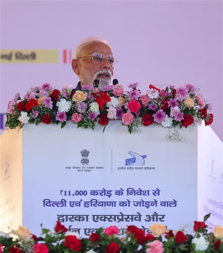 PM addressing the gathering at the inauguration ceremony of two major National Highway projects - the Delhi section of Dwarka Expressway and Urban Extension Road-II (UER-II) at Rohini, in Delhi on August 17, 2025.
