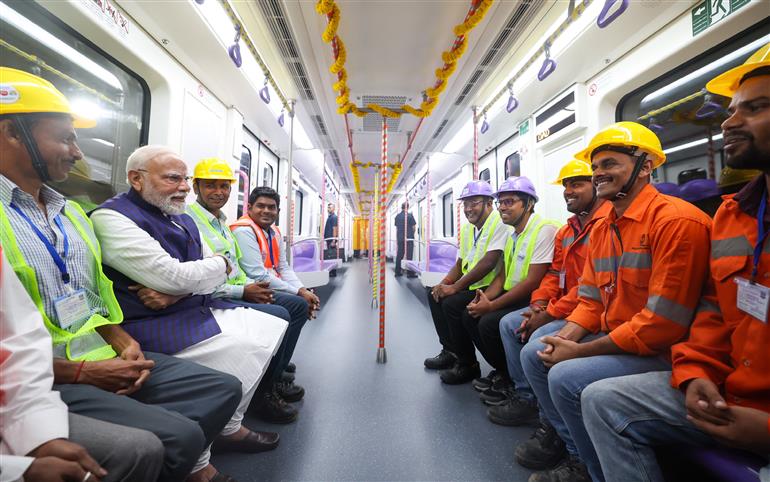 PM undertakes a metro ride at Kolkata, in West Bengal on August 22, 2025.