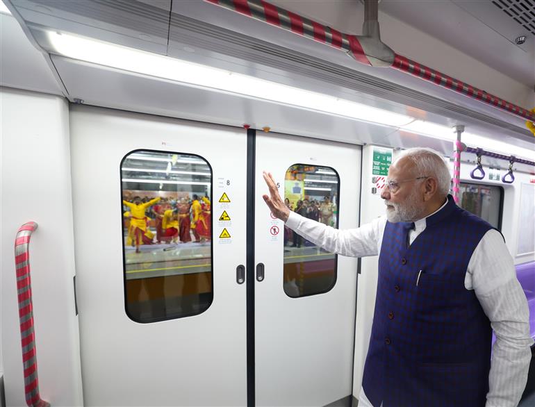 PM undertakes a metro ride at Kolkata, in West Bengal on August 22, 2025.