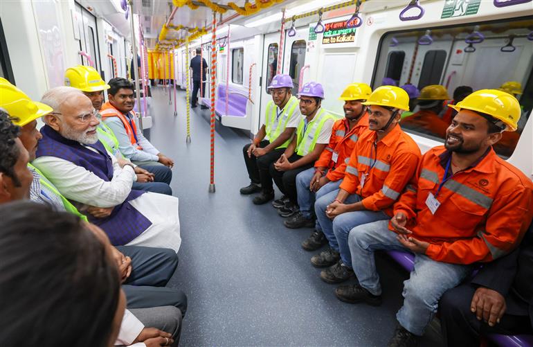 PM undertakes a metro ride at Kolkata, in West Bengal on August 22, 2025.