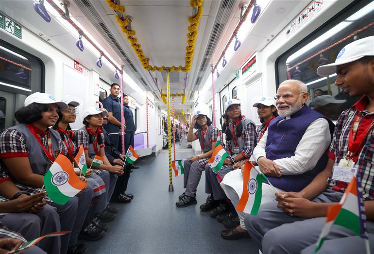 PM undertakes a metro ride at Kolkata, in West Bengal on August 22, 2025.