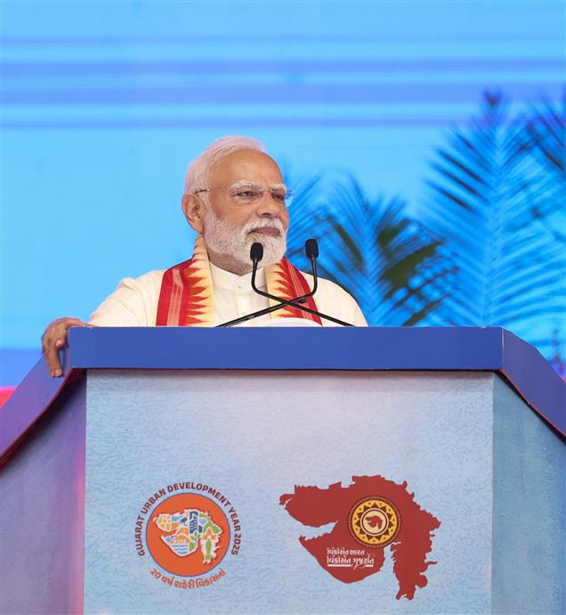 PM addressing the gathering at public function on the sidelines of the foundation stone laying, inauguration and dedication of multiple development projects to the nation held at Khodaldham ground (Ahmedabad), in Gujarat on August 25, 2025.