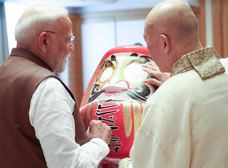 PM presented with a Daruma doll by the Chief Priest of Shorinzan Daruma Ji Temple, Mr. Rev Seishi Hirose in Tokyo, Japan on August 29, 2025.:Prime Minister's Office PM presented with a Daruma doll by the Chief Priest of Shorinzan Daruma Ji Temple, Mr. Rev Seishi Hirose in Tokyo, Japan on August 29, 2025.:Prime Minister