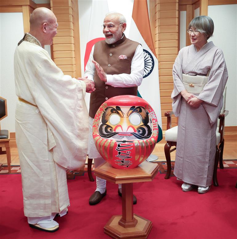 PM presented with a Daruma doll by the Chief Priest of Shorinzan Daruma Ji Temple, Mr. Rev Seishi Hirose in Tokyo, Japan on August 29, 2025.:Prime Minister's Office PM presented with a Daruma doll by the Chief Priest of Shorinzan Daruma Ji Temple, Mr. Rev Seishi Hirose in Tokyo, Japan on August 29, 2025.:Prime Minister