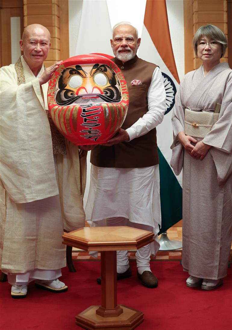 PM presented with a Daruma doll by the Chief Priest of Shorinzan Daruma Ji Temple, Mr. Rev Seishi Hirose in Tokyo, Japan on August 29, 2025.:Prime Minister's Office PM presented with a Daruma doll by the Chief Priest of Shorinzan Daruma Ji Temple, Mr. Rev Seishi Hirose in Tokyo, Japan on August 29, 2025.:Prime Minister