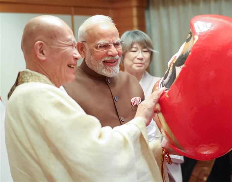 PM presented with a Daruma doll by the Chief Priest of Shorinzan Daruma Ji Temple, Mr. Rev Seishi Hirose in Tokyo, Japan on August 29, 2025.:Prime Minister's Office PM presented with a Daruma doll by the Chief Priest of Shorinzan Daruma Ji Temple, Mr. Rev Seishi Hirose in Tokyo, Japan on August 29, 2025.:Prime Minister