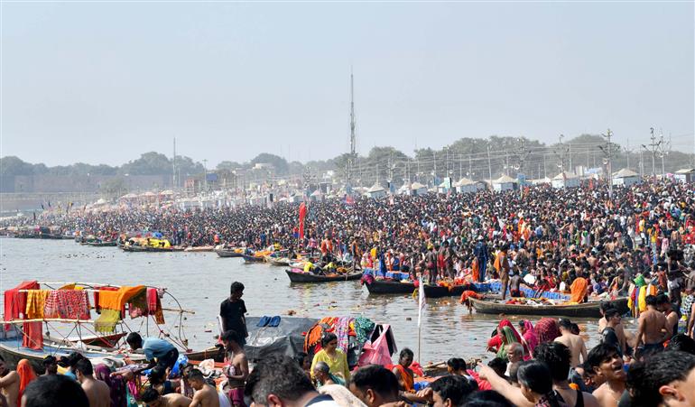 Sangam Snan during the Maha Kumbh Mela 2025 at Triveni Ghat, Prayagraj in Uttar Pradesh on February 17, 2025.