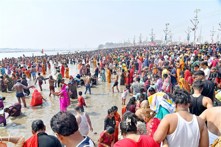 Sangam Snan during the Maha Kumbh Mela 2025 at Triveni Ghat, Prayagraj in Uttar Pradesh on February 17, 2025.